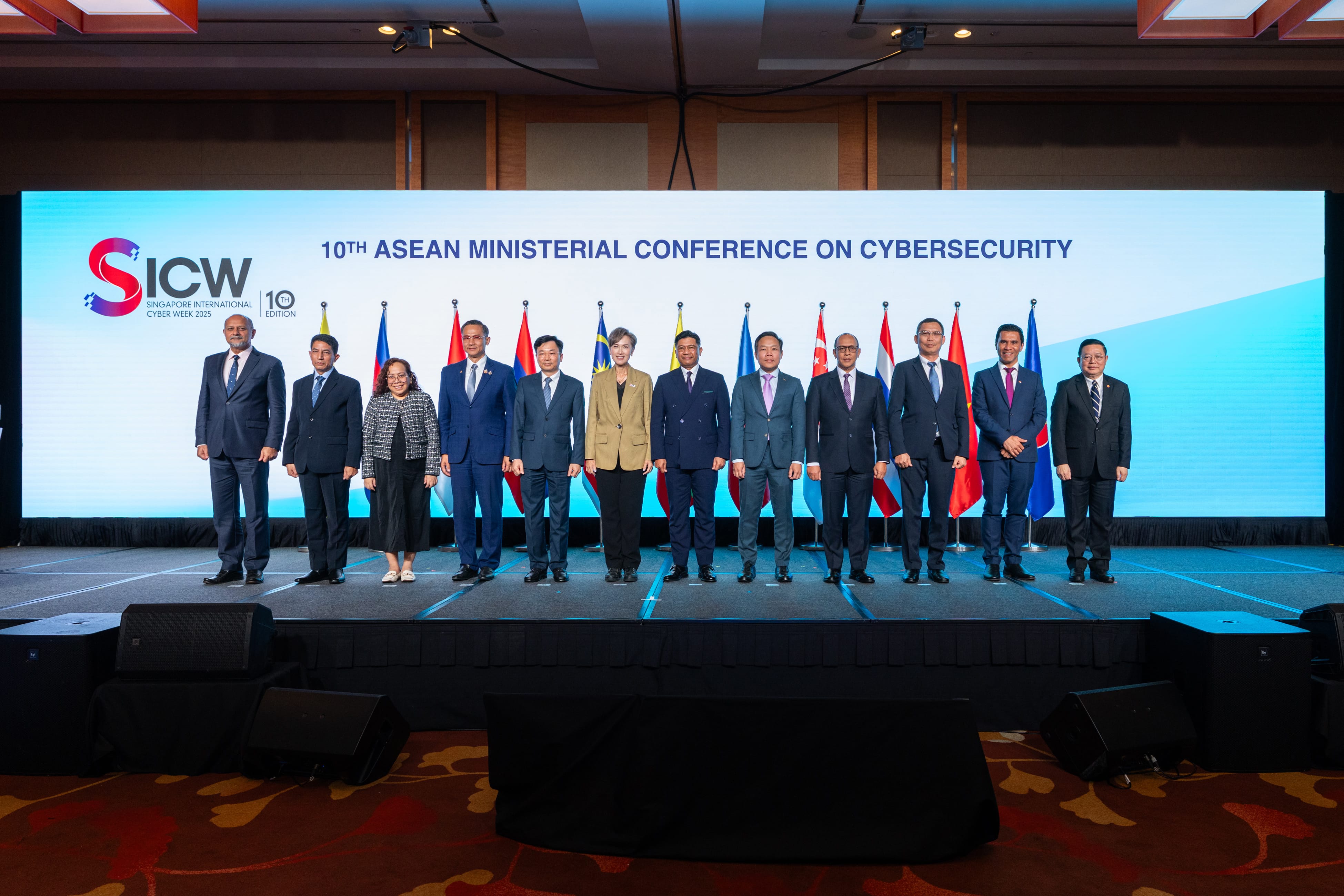 Image of speakers at the 10th AMCC